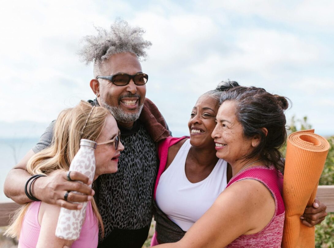 Adult friends smiling after workout